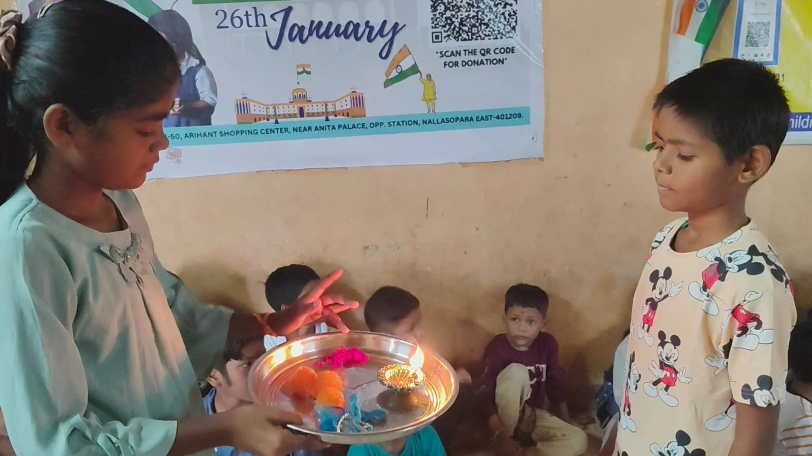 Volunteers with children on Raksha Bandhan